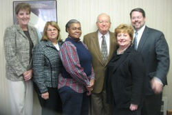 Left-to-Right: Vicki Coyle, NPLS Executive Director; Danna Rich-Collins, NPLS Office Manager; Lisa Covington, NPLS Law Office Assistant; William E. Nichols, Esq., President of Lycoming Law Association Foundation, Jessica A. Engel—Executive Director of Lycoming Law Association; J. Michael Wiley, Esq., President of the Lycoming Law Association.