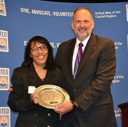 Rhodia D. Thompson receives the Grady Award from 2016 United Way Board Chair David M. Kleppinger.